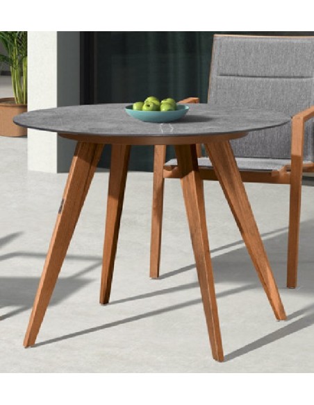 TAVOLO ROTONDO IN TEAK CON PIANO IN CERAMICA